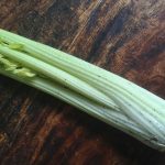 Celery laying on a table top