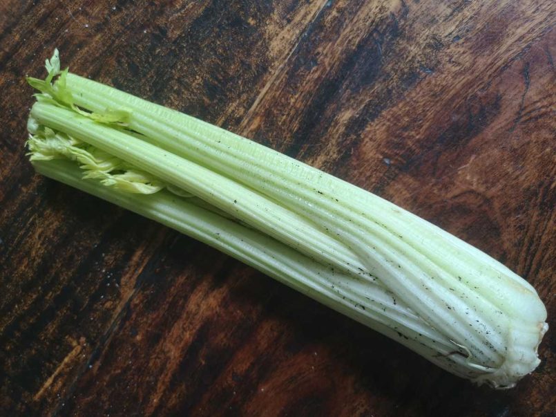 Celery laying on a table top