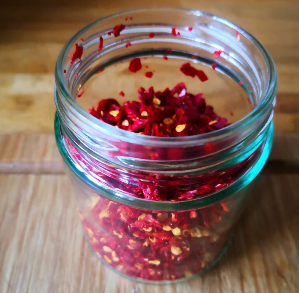 Dried chilli flakes in a jar